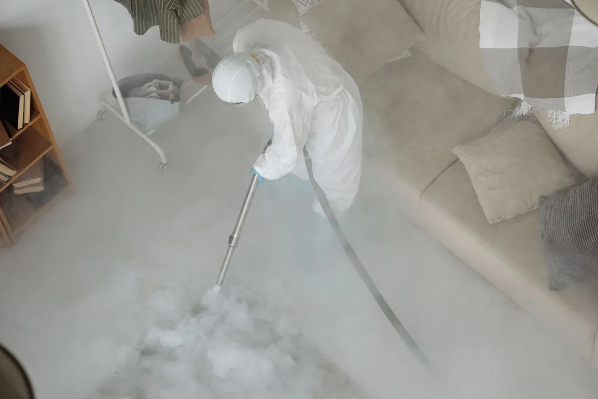 Biohazard cleanup technician in protective equipment, Cedar Bluff, AL
